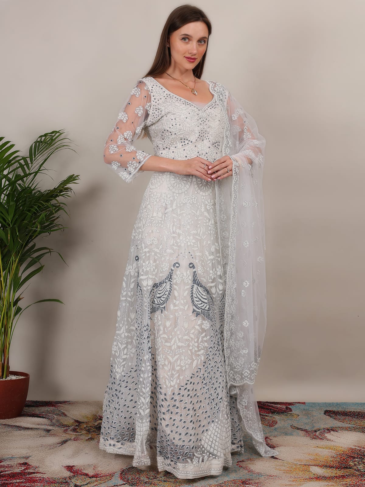 Adorable Net White Silver Color peacock Design Lehenga Choli