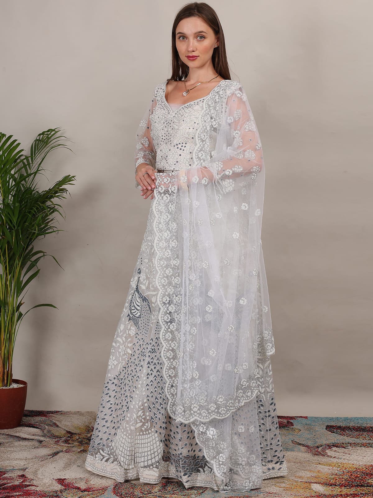 Adorable Net White Silver Color peacock Design Lehenga Choli