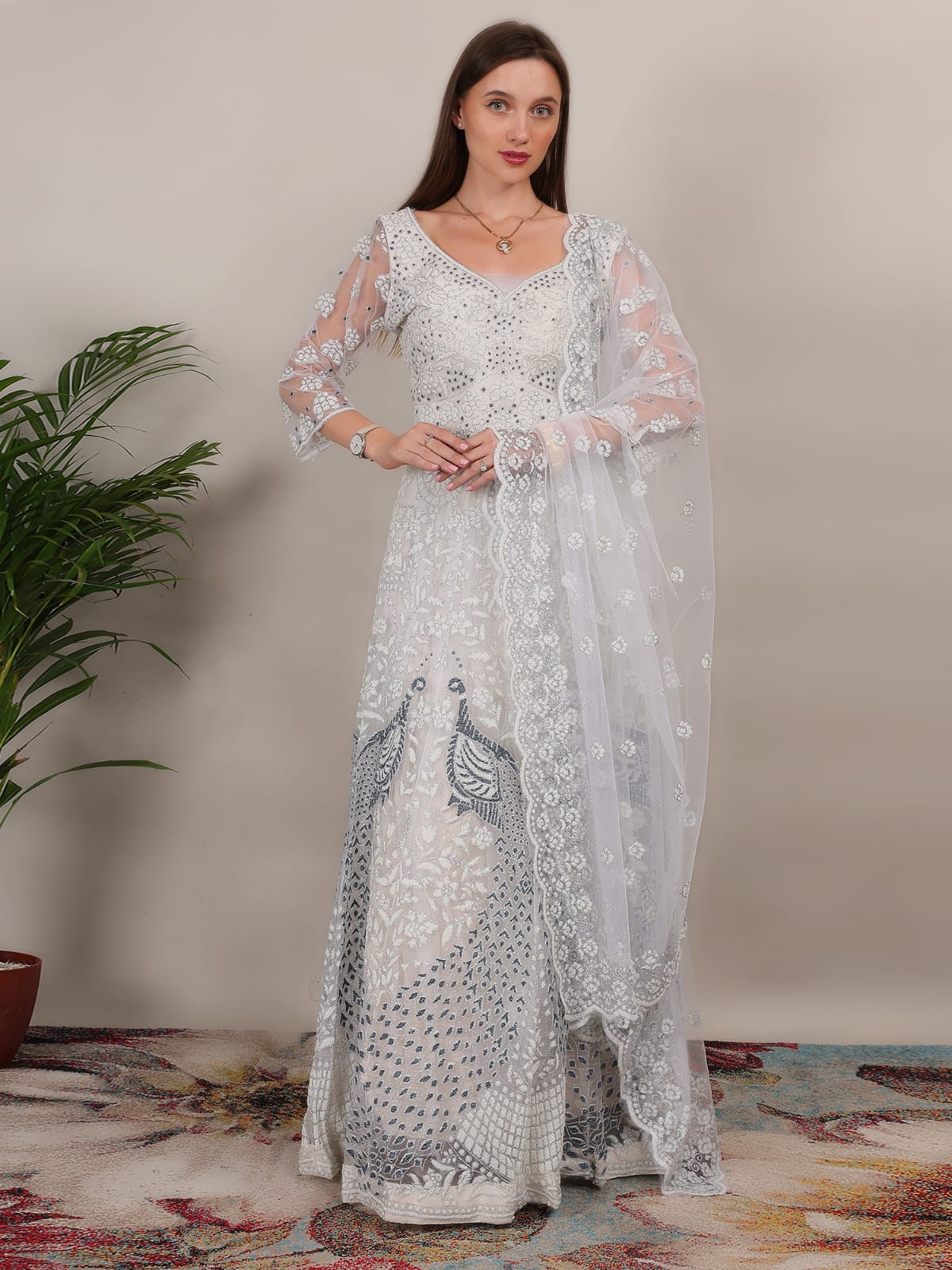 Adorable Net White Silver Color peacock Design Lehenga Choli